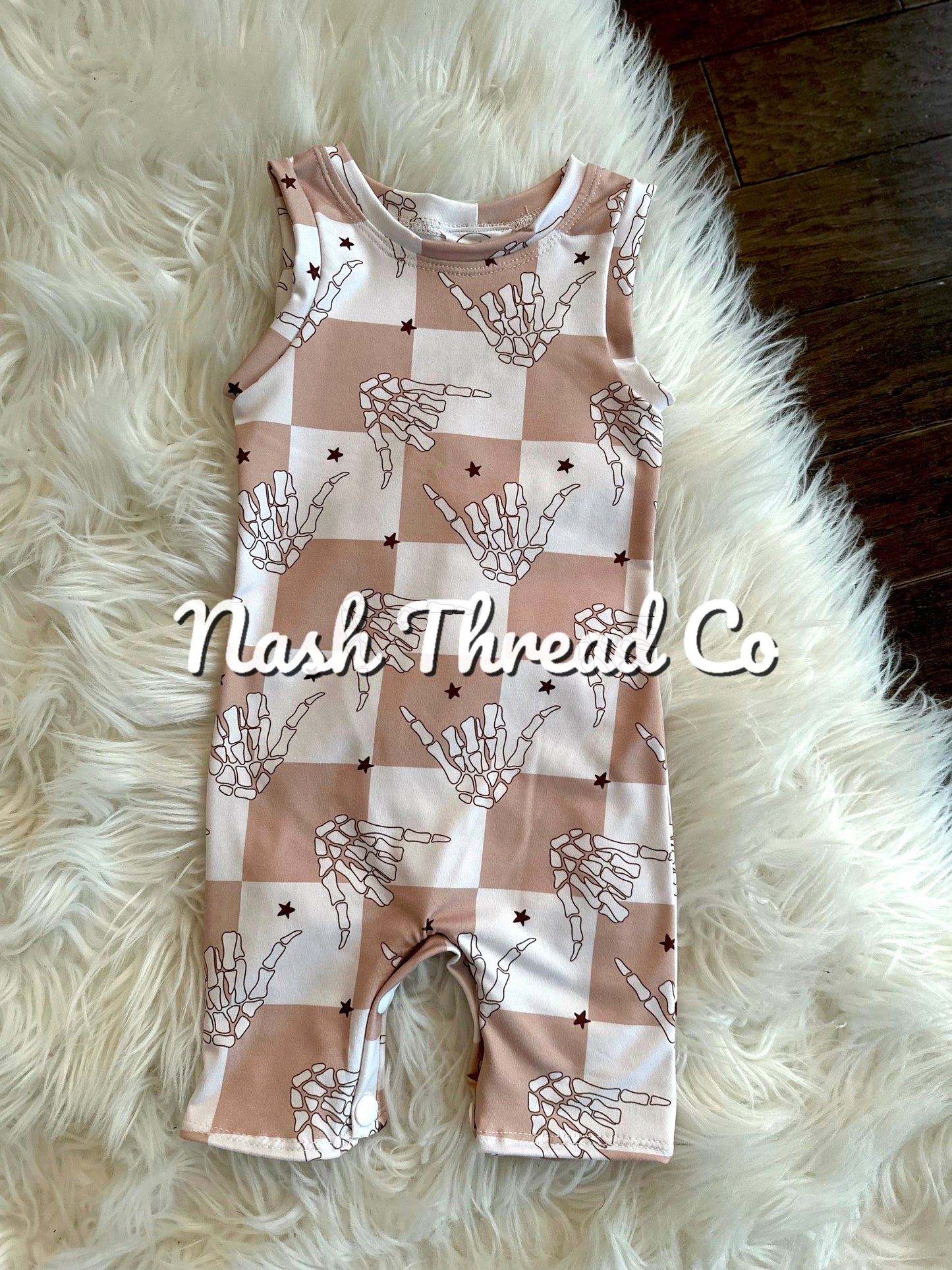 Rock out Ollie romper w/snaps